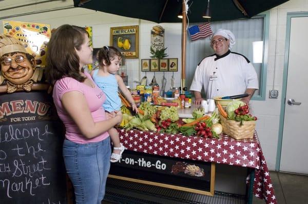 Chef Nils educates shoppers with cooking demonstrations