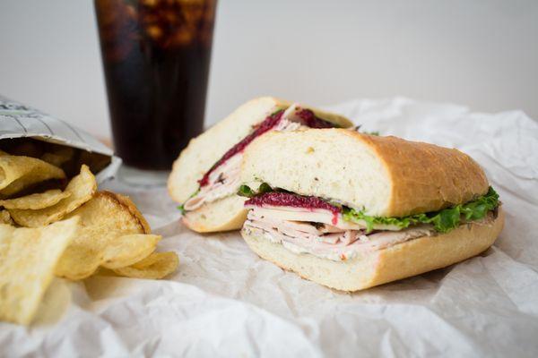 Jefferson: maple turkey, cranberry relish, cheddar, lettuce, herb mayonnaise, French bread.