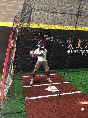 Taking hacks at On Deck Batting Cages