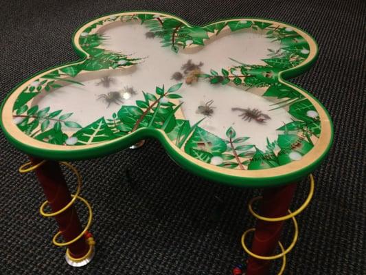 Cool table in the waiting room.