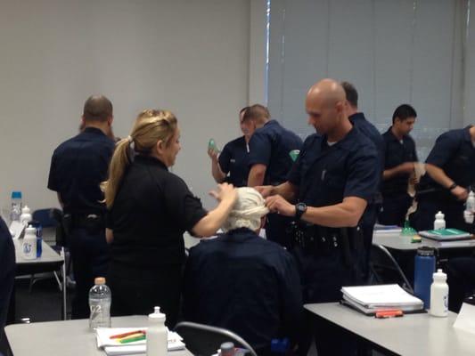 Maggie Teaching First Aid At Police Academy