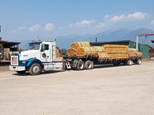 Fence post loaded for delivery.