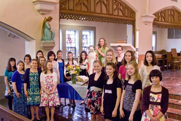 Blessed Sacrament students crown Mary our mother.