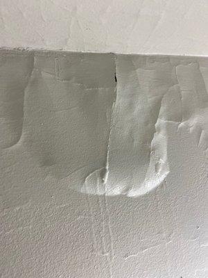 Wall damage in ceiling