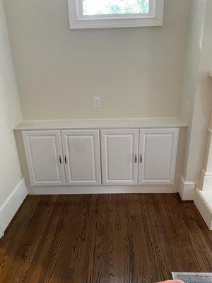 Custom cabinet installation with countertop addition.