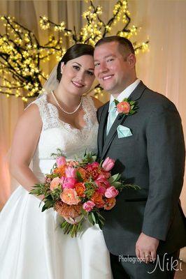 Wedding bouquet and boutonnière by Senter Piece with photography by Niki.