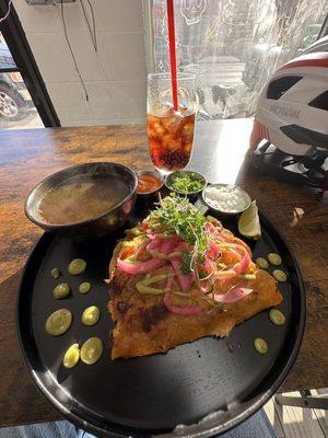 Beautiful presentation of delicious Tacos barbacoa.  Delicious.
 And they actually serve pop in cans with a glass full of ice cubes.