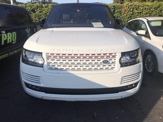 Custom painted front end of a brand new range rover