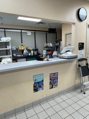 Front desk, where they take in anything you want done FOR you, laundry/wise. Another picture shows the services provided and prices.