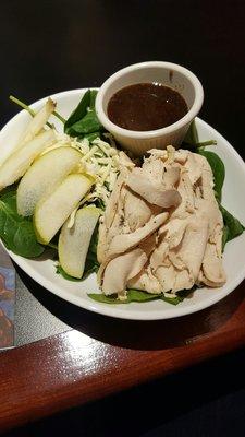 Pear chicken salad with a side of balsamic vinegarette.