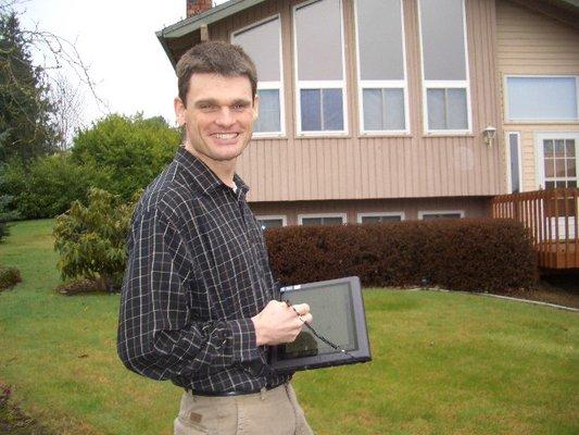 This is the owner of A Quality Measurement, Gary Kristensen with a tablet computer ready to do a home measurement floor plan ...