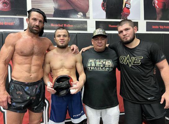 UFC fighter Luke Rockhold, UFC fighter Umar Nurmagomedov, Coach Hector, and former UFC champion Khabib Nurmagomedov