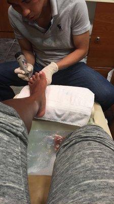 David tending to my feet during a classic pedi!