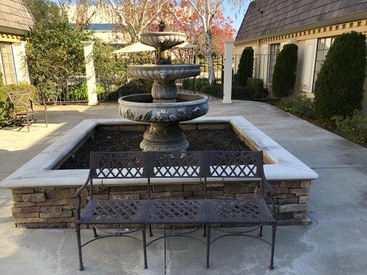 A fountain in Plum Trees courtyard.