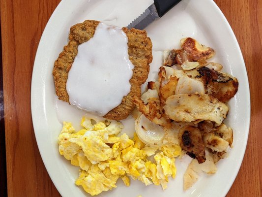 Chicken fried steak w/ Eggs & Home fries