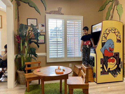 Fun play area in the waiting room. Whole office decorated for kids and full of prizes and games. My son loves it.