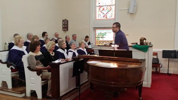 A full choir loft and an awesome new choir director.