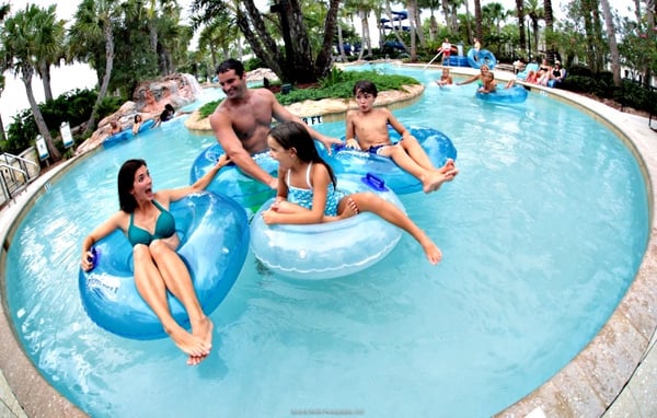 resort-style pool with lazy river and waterslide