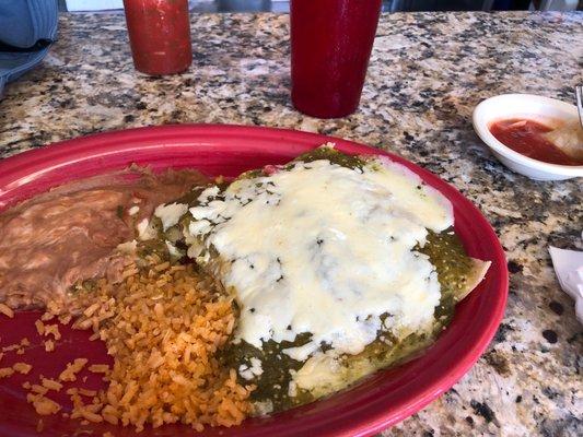 Chicken enchiladas with rice and beans, salsa on side