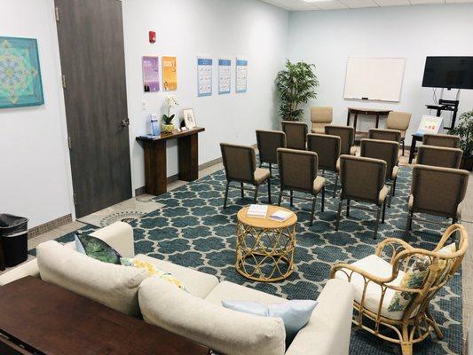 This is our reception area for Intro talks. Currently our chairs are set up for 6-ft socially-distanced seating (not as shown in this photo)