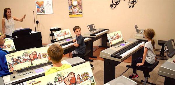 One of the many group piano classes taught by the owner and piano instructor, Jordane Lafitte