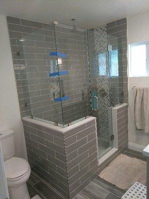 Custom-sized frameless shower enclosures w/ 3/8" glass available