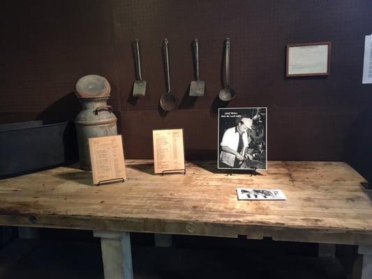 Butcher block table from mess hall and utensils