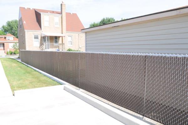 Galvanized Chian-link with Brown Pds (privacy strips)