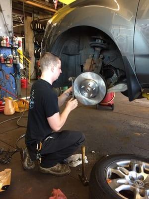 Colin (technician) installing my new brakes.