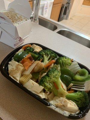 Mixed veggies and tofu with rice. Ton of food for a low price!