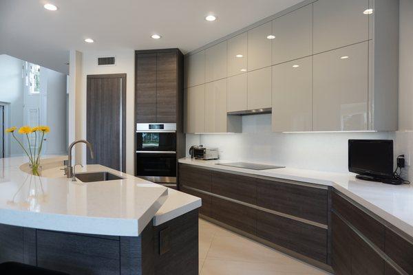 Combination textured and high gloss cabinets