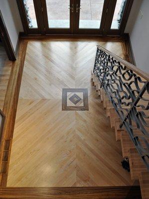 Maple wood floor with zebra inlay