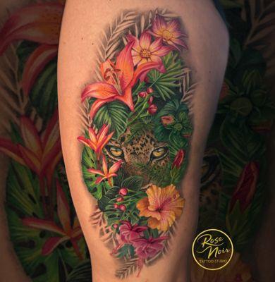 Leopard and tropical flowers and foliage by shop owner and tattoo artist Megan Wood!