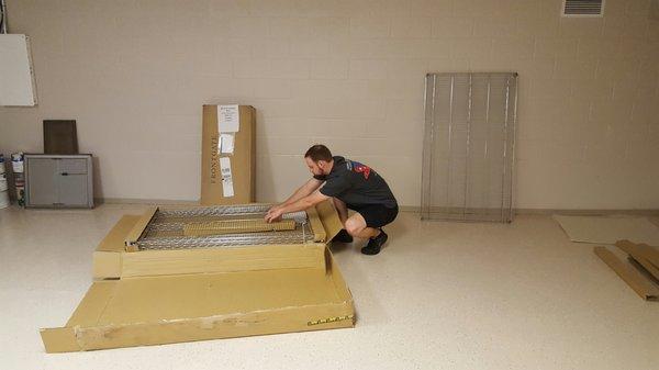 Assembling storage racks in the garage.