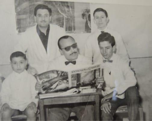 Young George studying with Italy's best Barbers