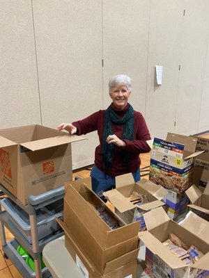 Filling totes for Shepherd Community Center.