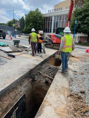 Replacement of main sewer line across colfax avenue for the historic Tattered cover book store