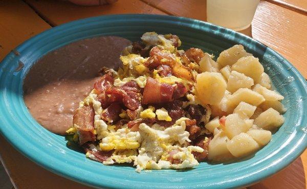 Their Mexican potatoes and refried beans were perfect breakfast plate companions... eggs and bacon mixed per our request.... perfection!