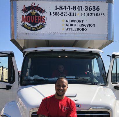 Mr.Ivan Smiling in front of one of our 2018 26ft Freightliner commercial box truck.