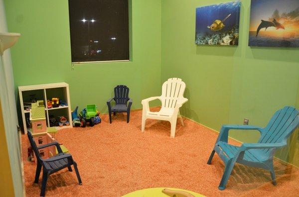 Himalayan sea salt covers the floor while the kids can play with toys during their salt session!