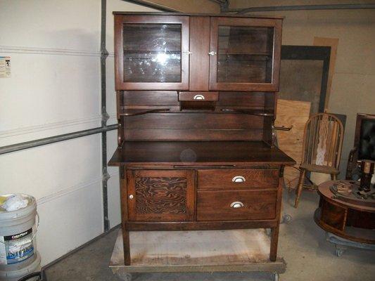 This old Kitchen cabinet was painted white with coat after coat of paint - we picked it up in pieces at customers home - total restoration!