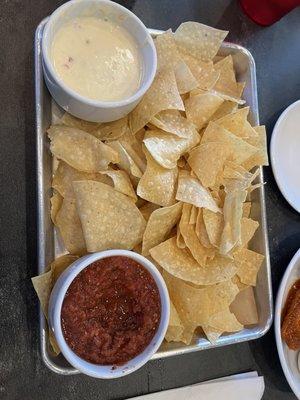 Chips and salsa with queso add on