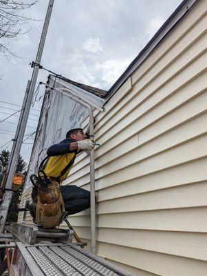 Our siding crew working hard to make sure all details are done right