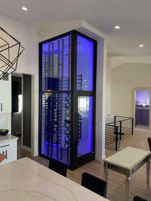 Front and Back of a Wine Room Installed in this Chandler, AZ Home w/ Bronze Aluminum Framing and One Inch LowE Tempered Glass.