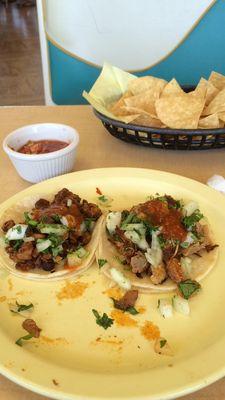 Street tacos. Al pastor on the left and carnitas on the right.