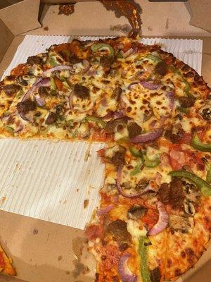 Large thin crust deluxe pizza