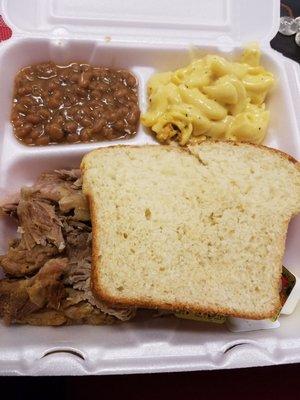 Pull Pork sandwich with homemade Bread, Mac and Cheese and Baked Beans. SO GOOD.