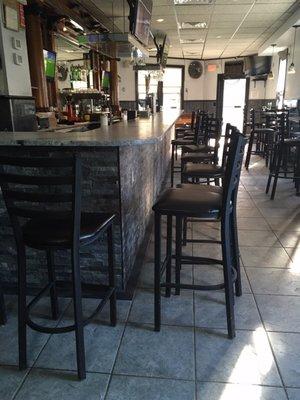 Updated Bar top with 4 featured beers on tap including an expresso machine.