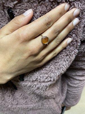 Custom amber ring with dainty band.