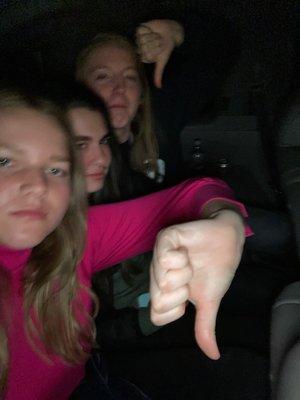 me and my friends, with our thumbs down and faces not mad, but disappointed